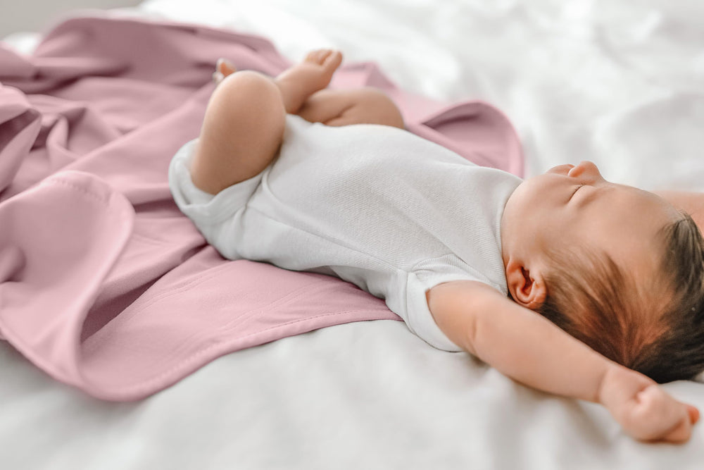 The Ollie Swaddle includes a mesh bag to protect fabric during washing.