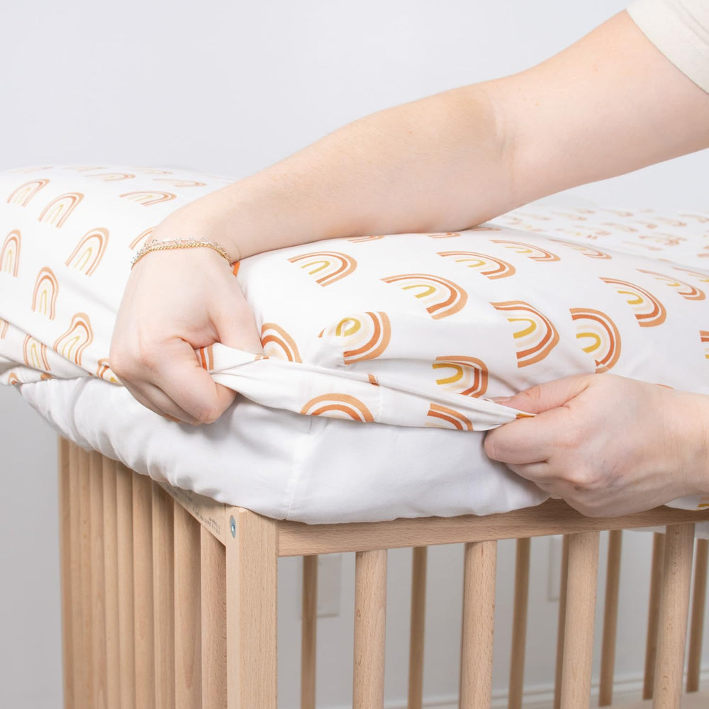 The Peanutshell neutral-solids sheet complements any nursery with soft, breathable comfort.