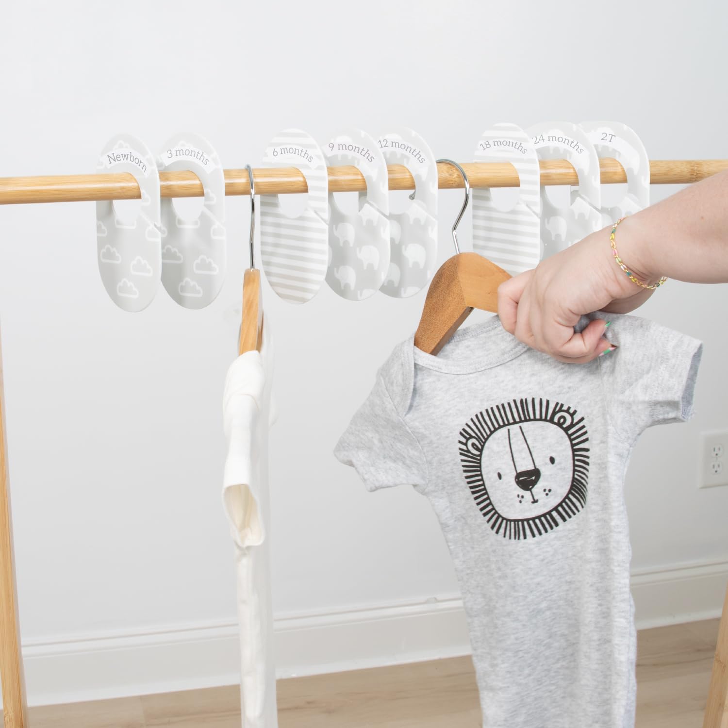 The Peanutshell baby closet organizer set shown in a compact dresser setup