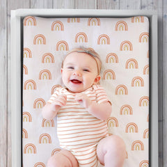 The Peanutshell boho rainbow changing pad cover fits standard 16x32 with snug elastic band