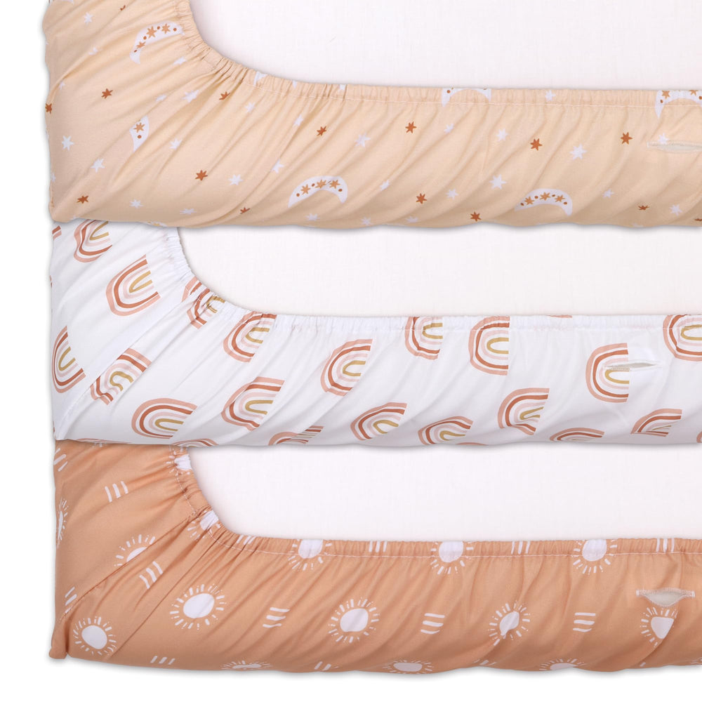 The Peanutshell boho rainbow changing pad cover machine washable for easy care