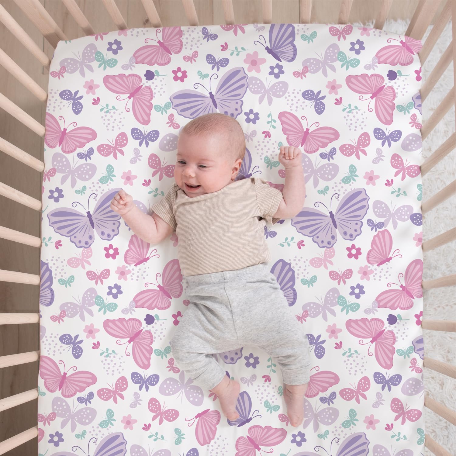 The Peanutshell Butterfly Song dust ruffle adds finished nursery decor.
