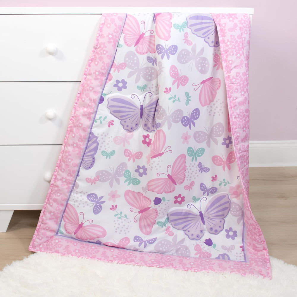 The Peanutshell Butterfly Song nursery setup shows coordinated 3-piece set.