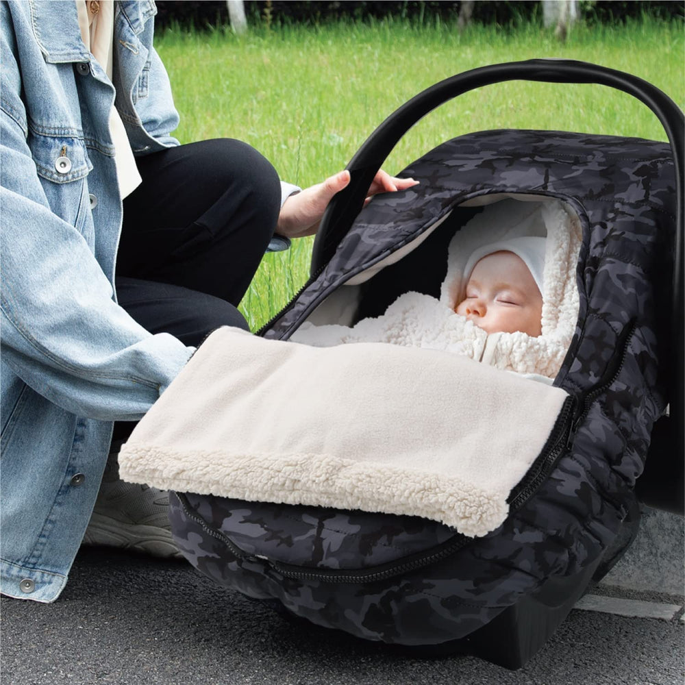 The Peanutshell car seat cover in use during a car ride