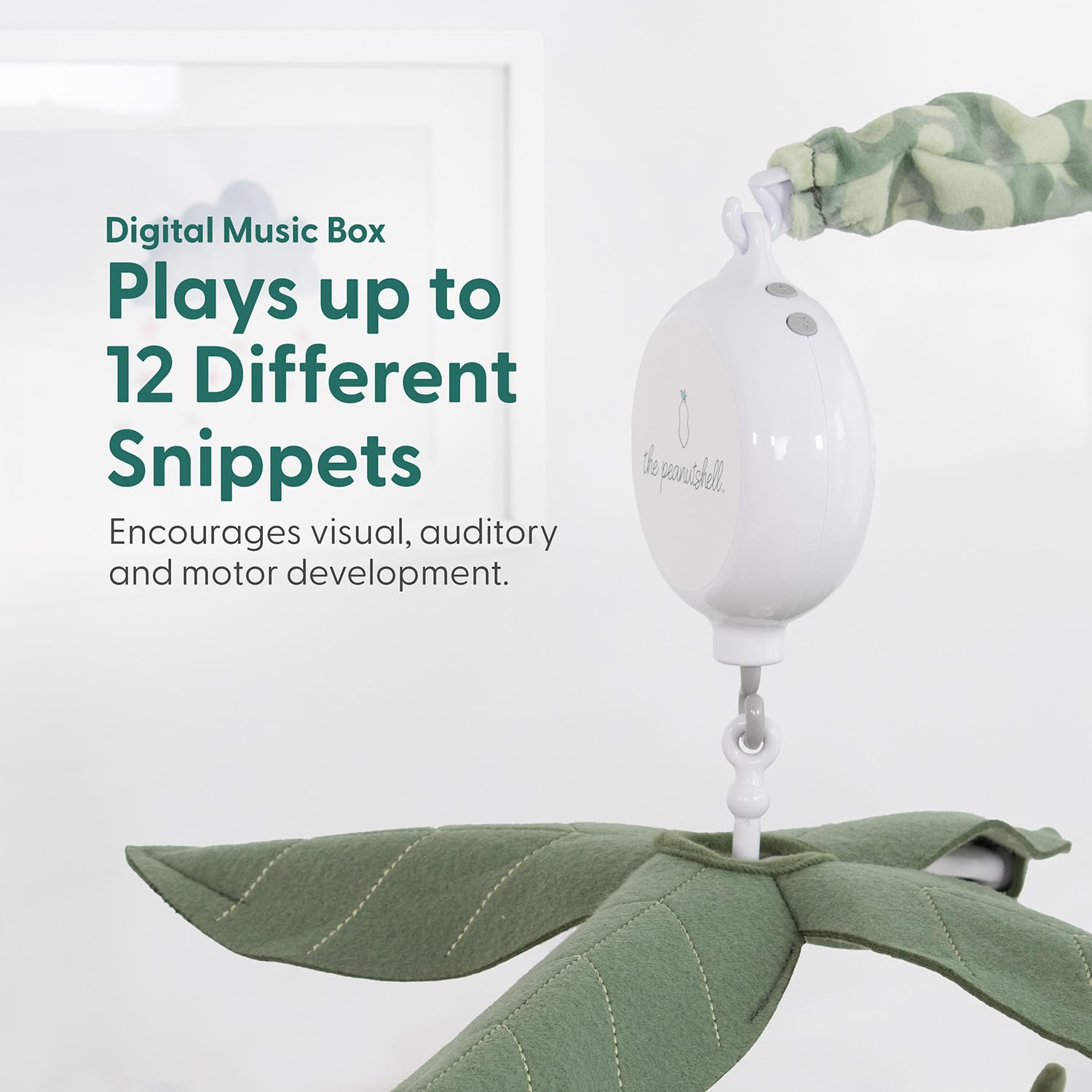The detachable arm on The Peanutshell mobile enables easy setup and storage.