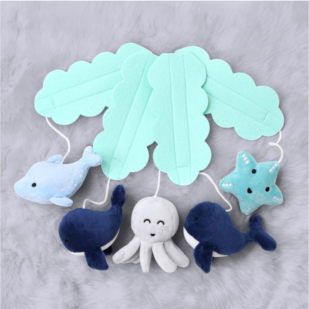 The Peanutshell crib mobile-easy-assembly enables quick setup for flexible decor.