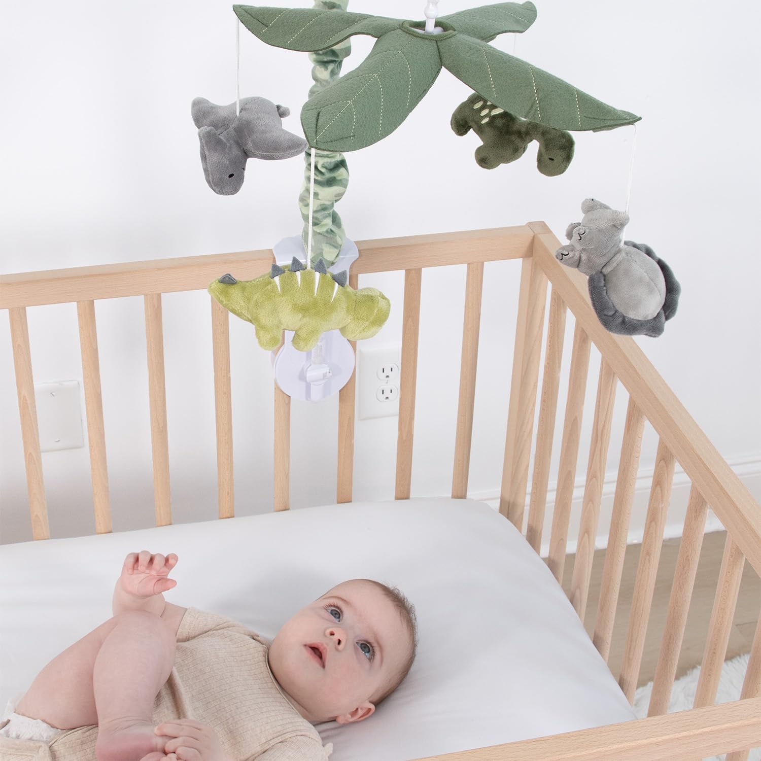 The Peanutshell mobile fits standard cribs for quick, versatile placement.