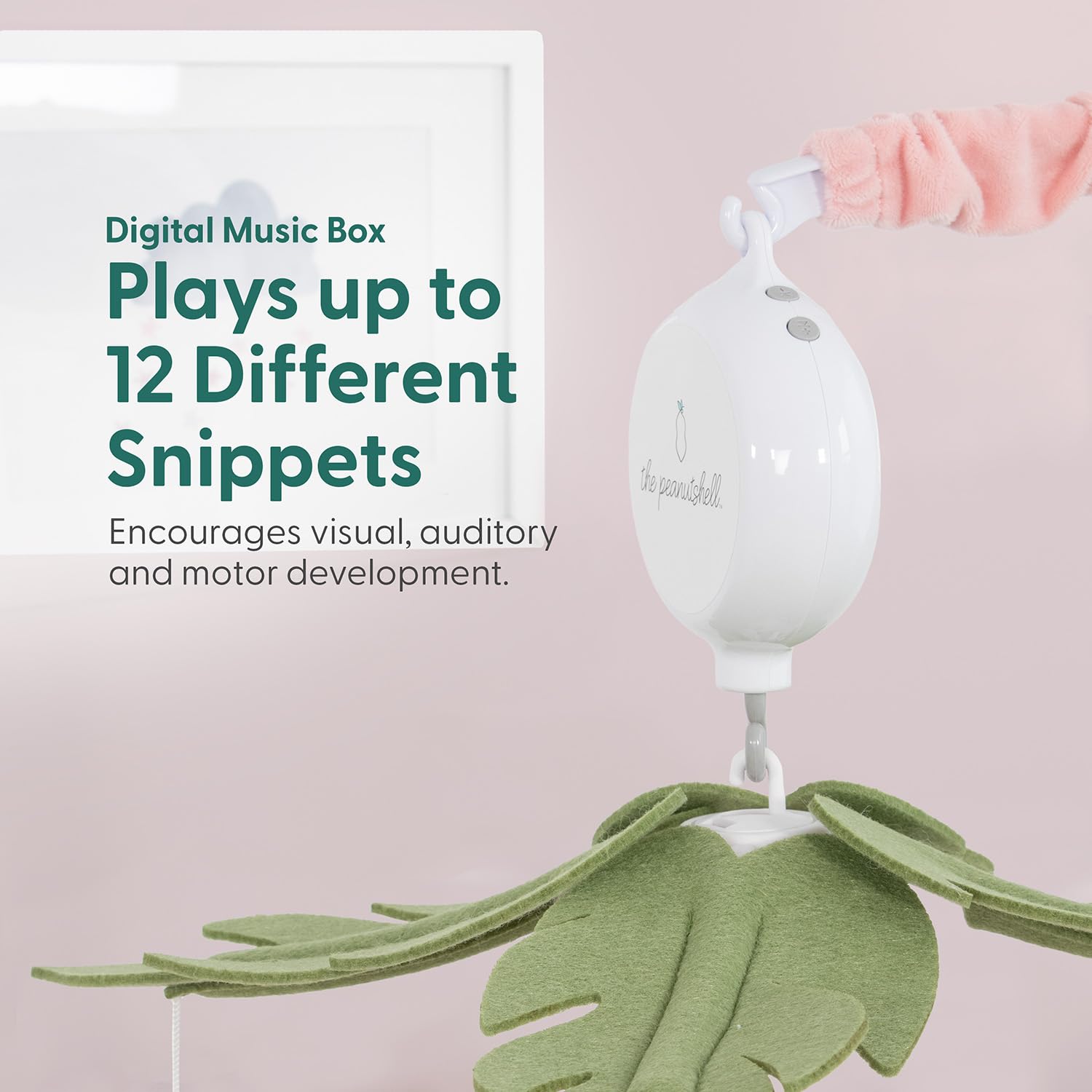 The Peanutshell crib mobile rotating motion shown in action for tranquil baby sleep.