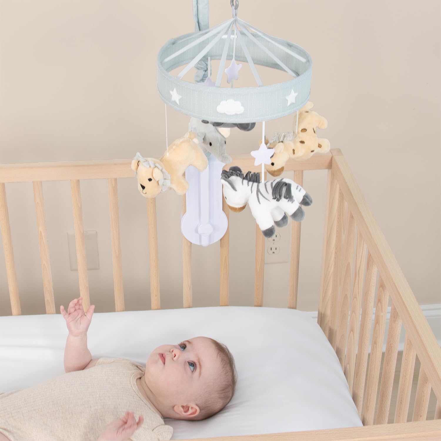 The Peanutshell crib mobile fits standard cribs for simple setup.