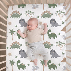 The Peanutshell Dinosaur Dreams bed skirt demonstrates complete nursery coordination and clean lines.