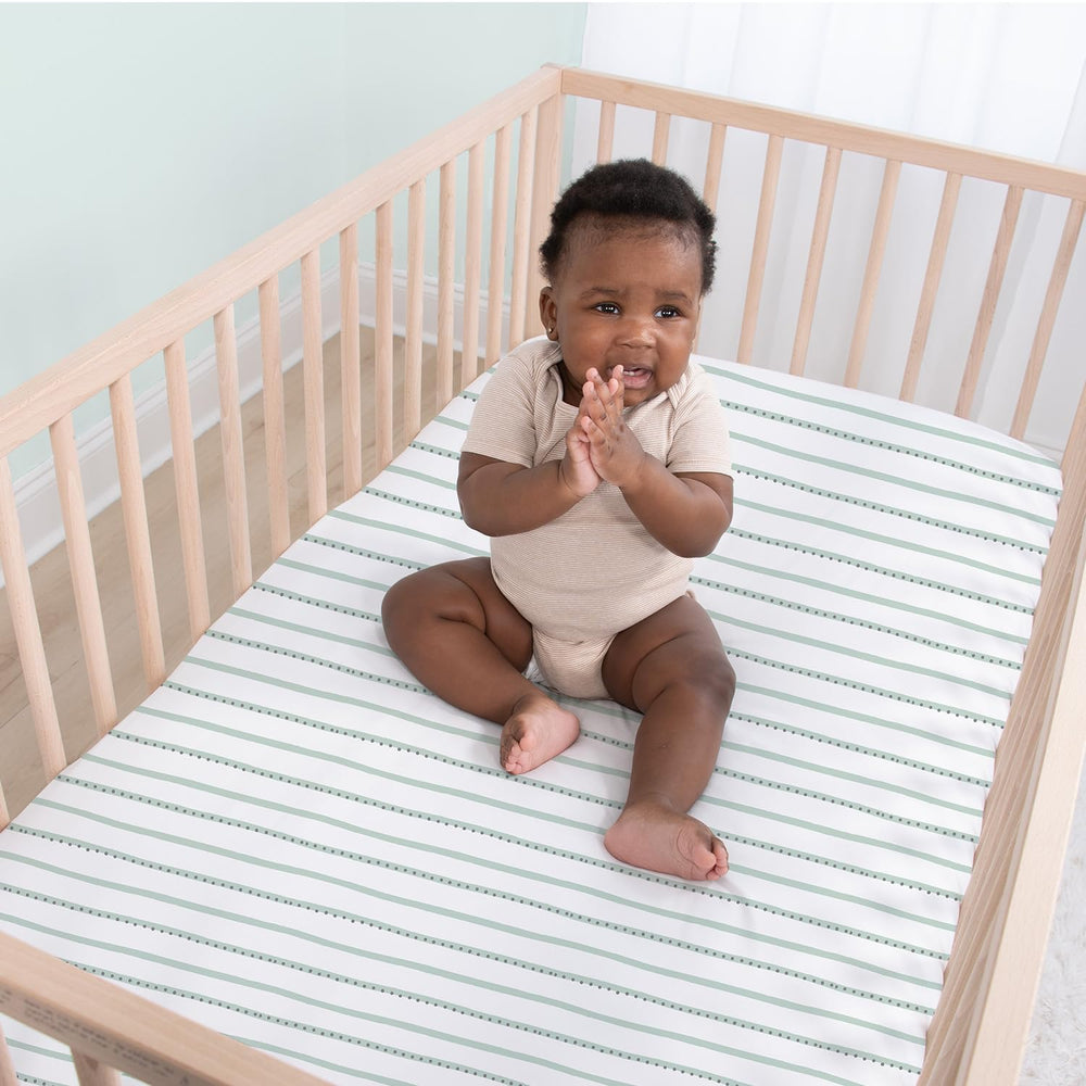 The Peanutshell durable easy-care crib sheets stay soft after frequent washing.