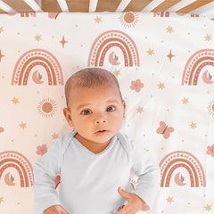 The Peanutshell dust ruffle detail adds soft, finished nursery style