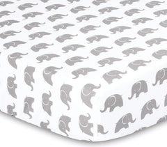 The Peanutshell Elephant Walk bed skirt completes a coordinated nursery setup.
