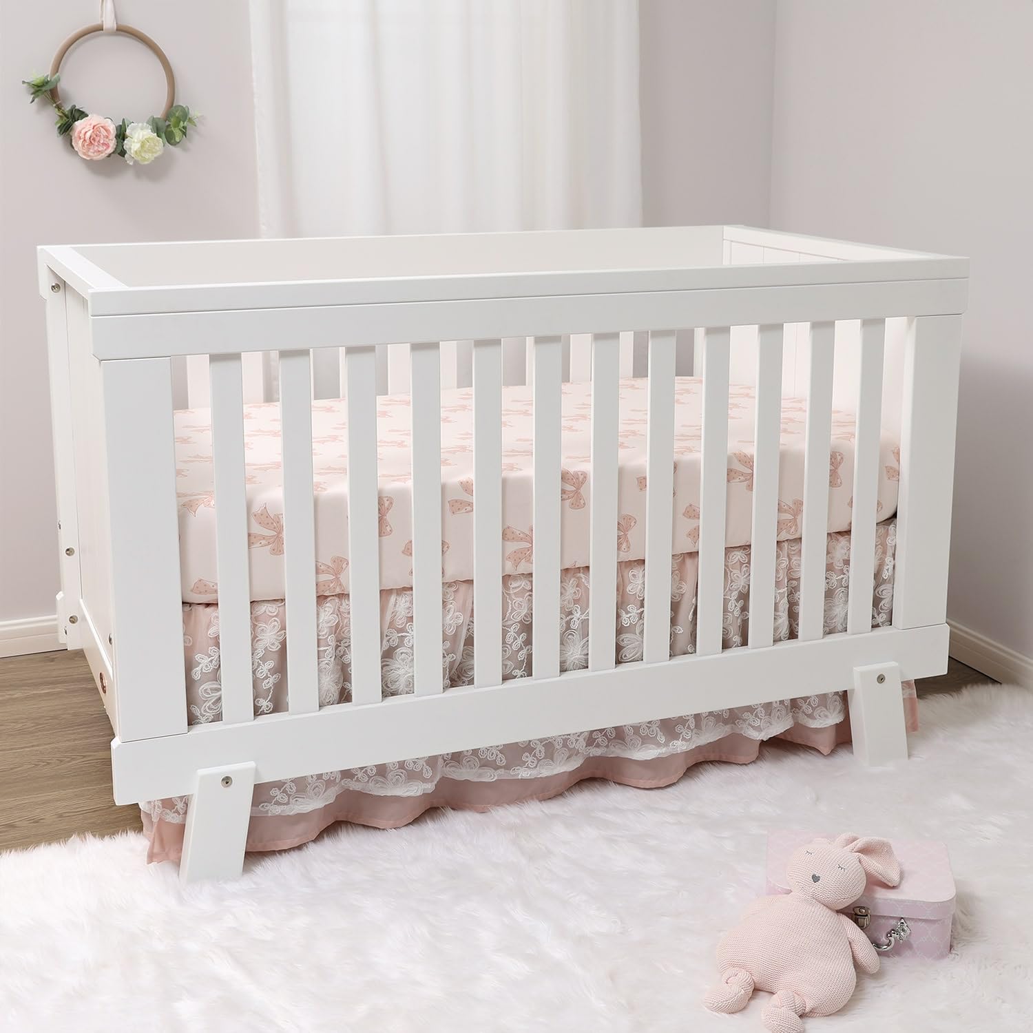 The Peanutshell Grace gold trim accents add nursery elegance and shine.