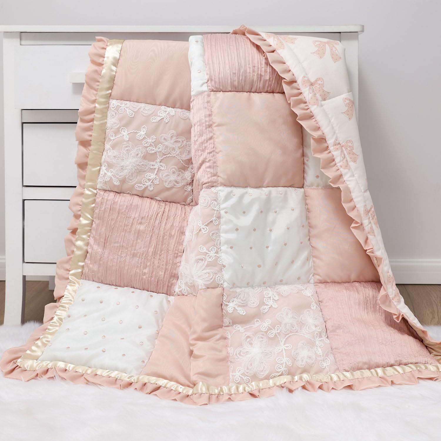 The Peanutshell Grace quilt embroidery details highlight delicate textures and charm.