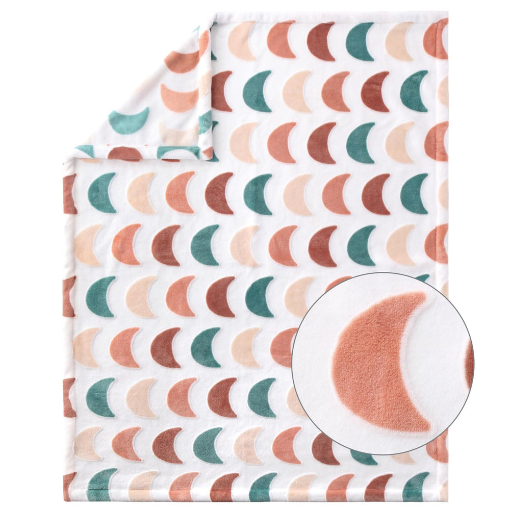 The Peanutshell Joshua Tree soft velour blanket for warmth and cuddles.