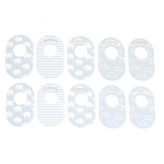The Peanutshell newborn to 2T size labels demonstrate easy outfit sorting in a closet