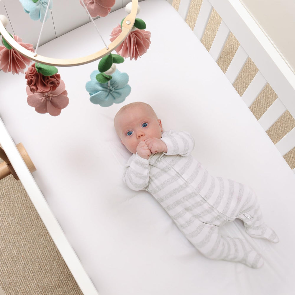 The Peanutshell wildflower-themed nursery decor adds a playful, nature-inspired touch to the nursery.
