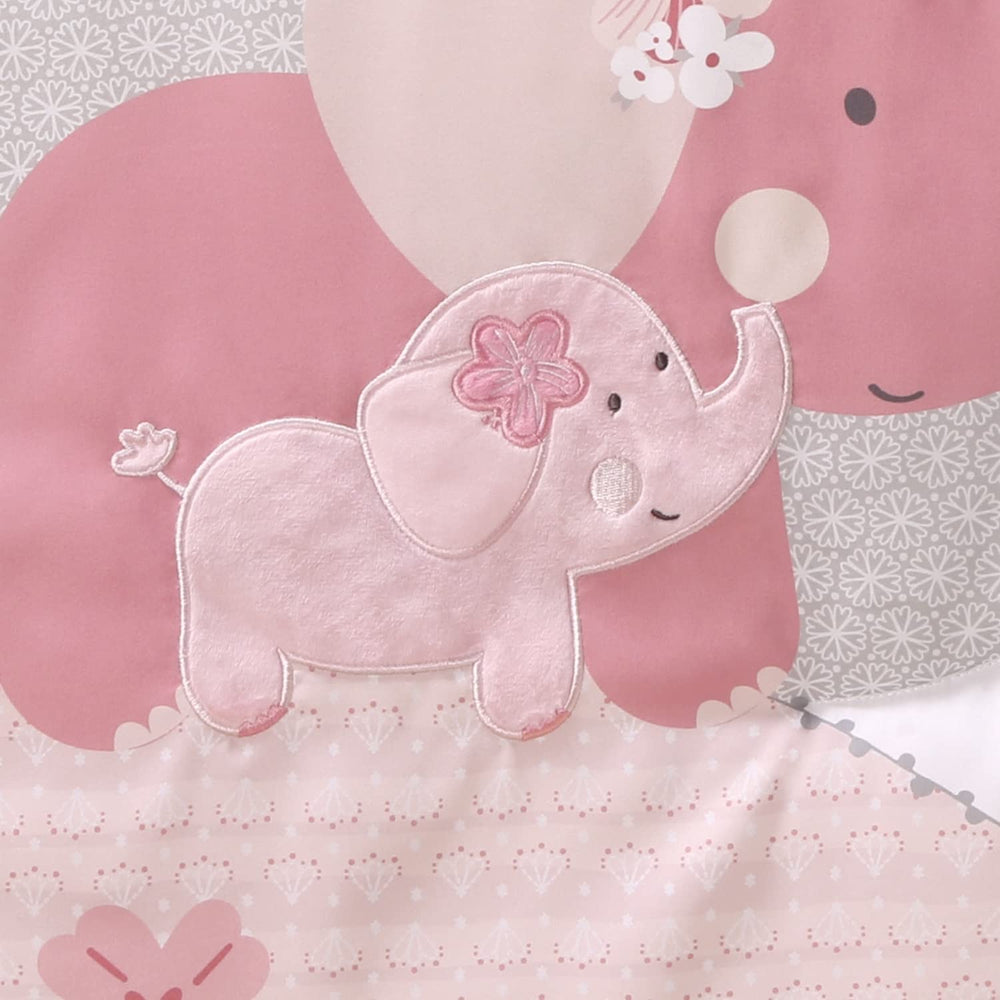 The Peanutshell pink elephant nursery display featuring a coordinated three-piece bedding set.