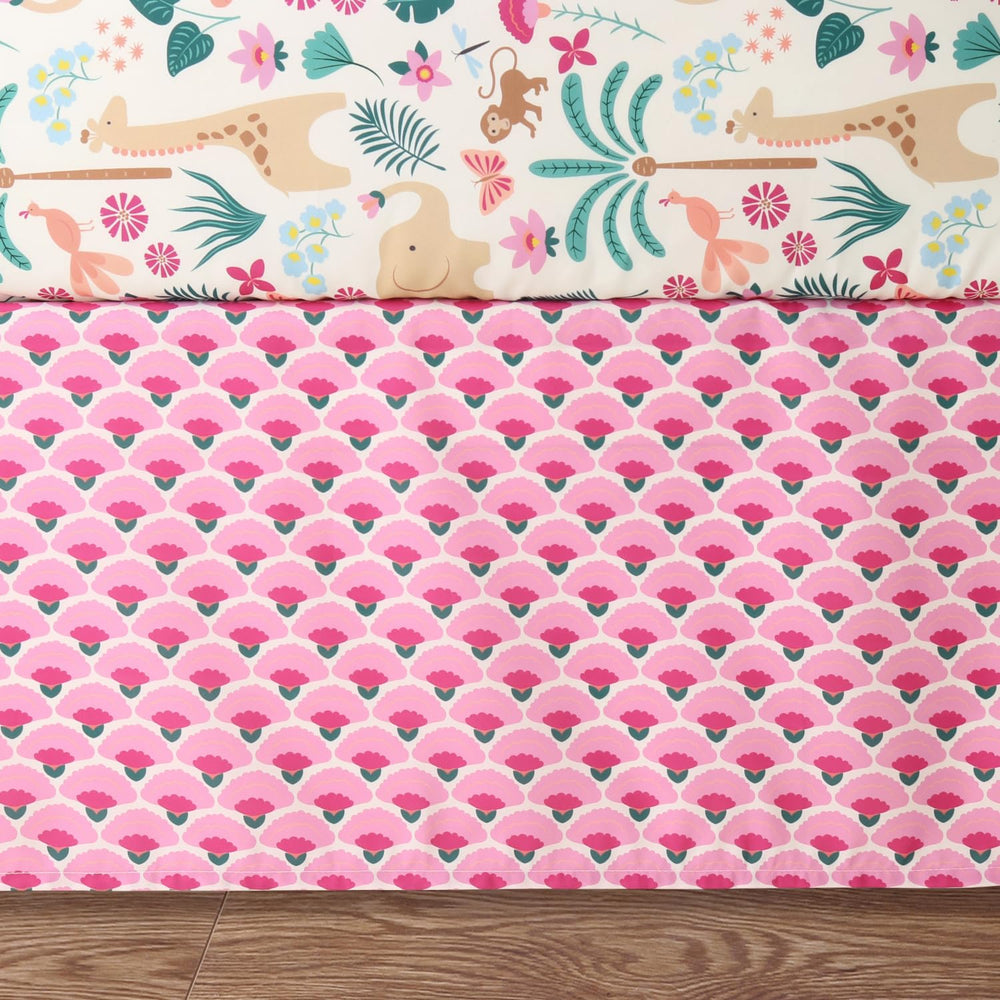 The Peanutshell safari-animals-and-flowers design adds color and charm to a newborn nursery.