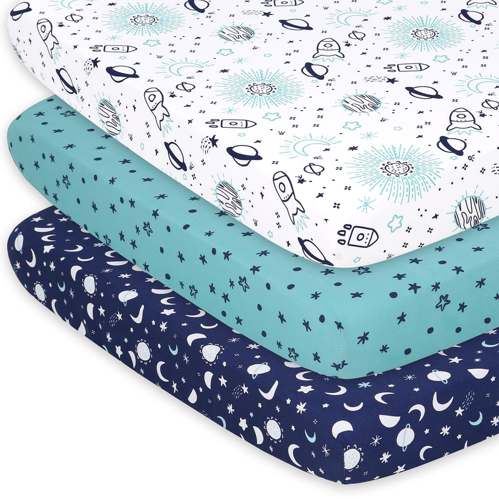 The Peanutshell space playard sheet closeup shows ultra-soft fabric for cozy naps.