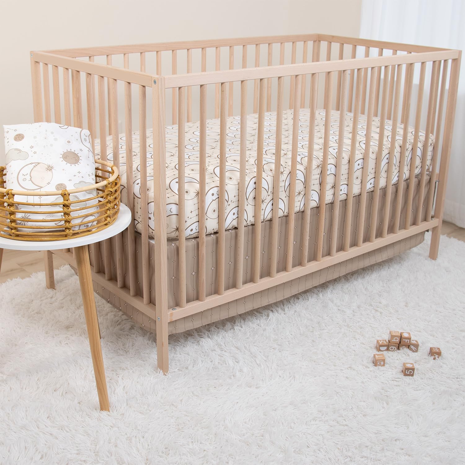 The Peanutshell Starry Skies nursery setup image for cohesive decor
