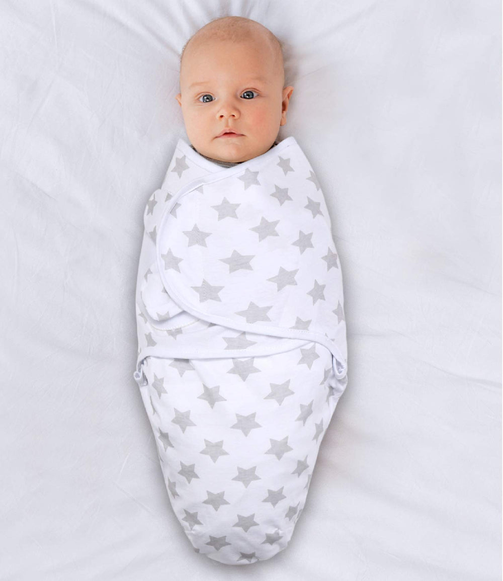 The Peanutshell swaddle blanket confetti-dots close-up shows soft breathable fabric