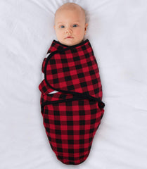 The Peanutshell swaddle showing hook-and-loop wings for adjustable secure fit