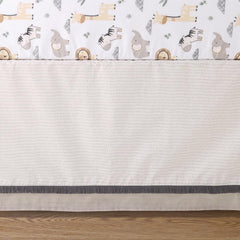 The Peanutshell tailored bed skirt adds polished nursery style and hidden storage.