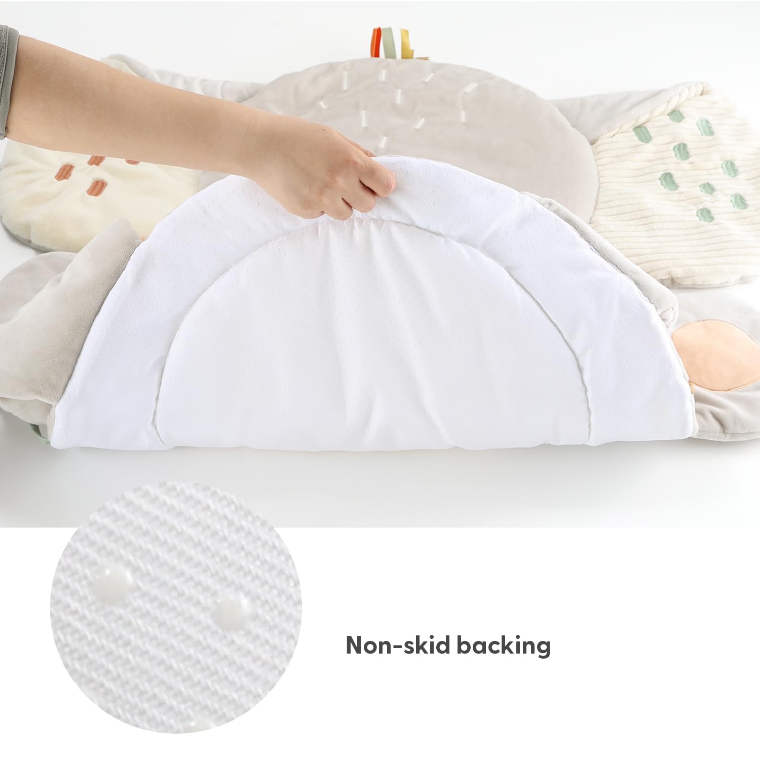 The Peanutshell tummy time mat includes a baby-safe mirror to engage gaze and head movement.