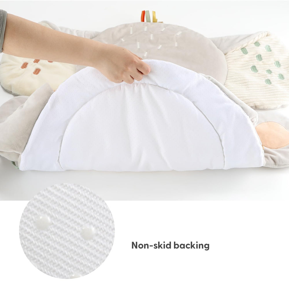 The Peanutshell tummy time mat includes a baby-safe mirror to engage gaze and head movement.