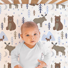 The Peanutshell Under The Stars bed skirt detail highlights coordinated nursery decor