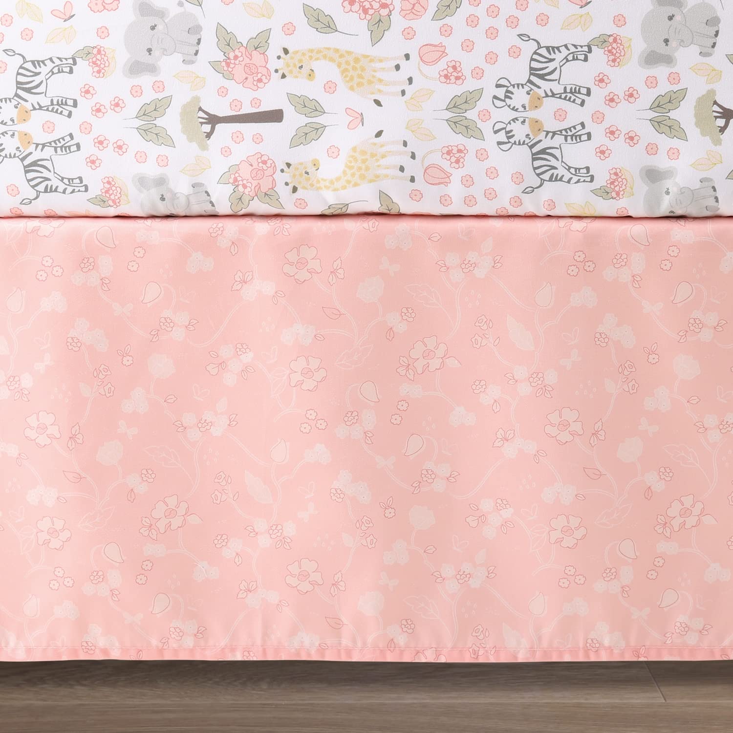 The Peanutshell Wildest Dreams nursery layout showcases the safari theme in pink and white.