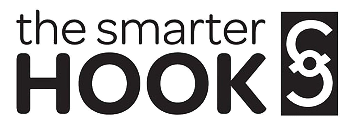 The Smarter Hook Tsh White mounted on a cart handle for hands-free organization.