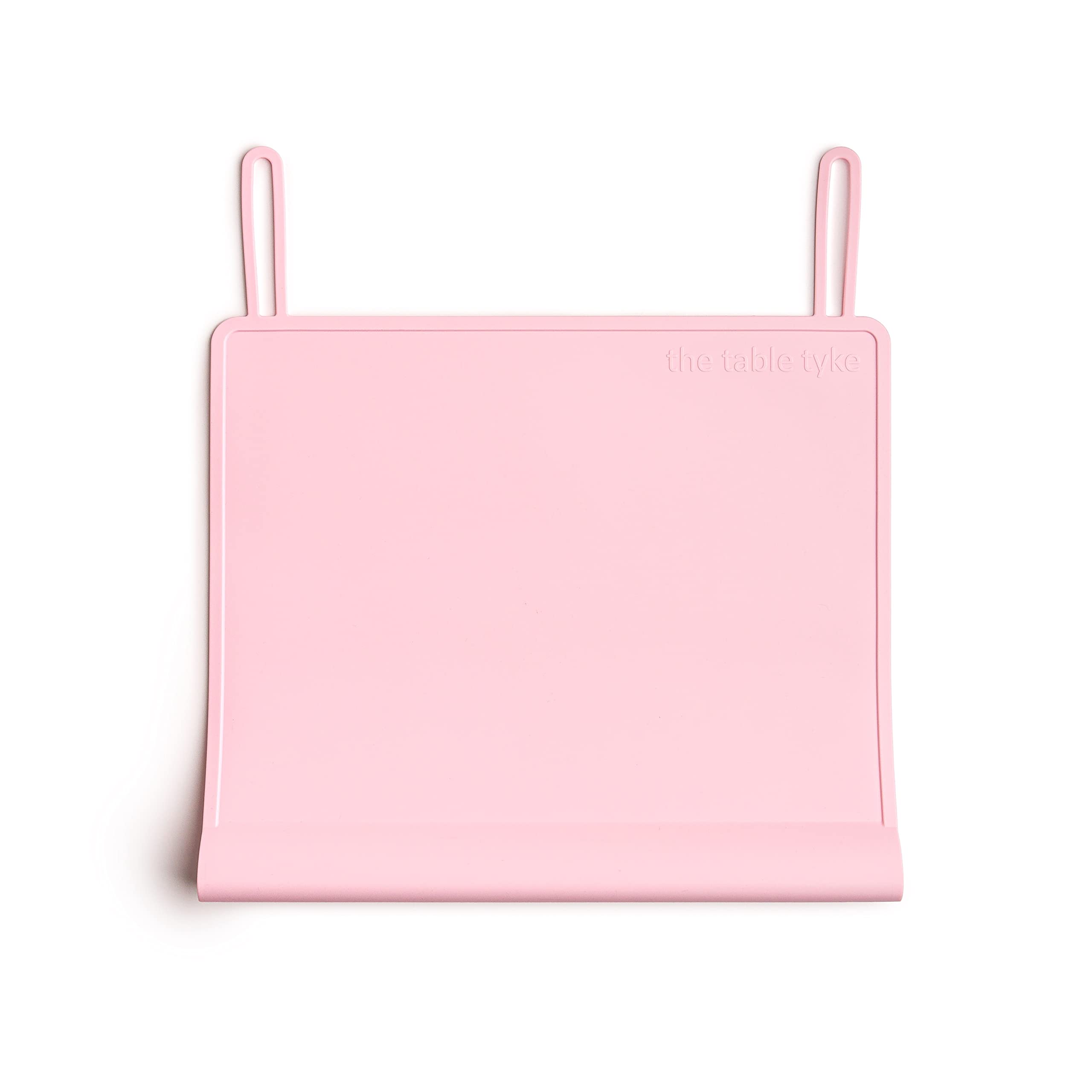 The Table Tyke Ballet Pink placemat edge bumper protects your child's gums from table edges during meals.