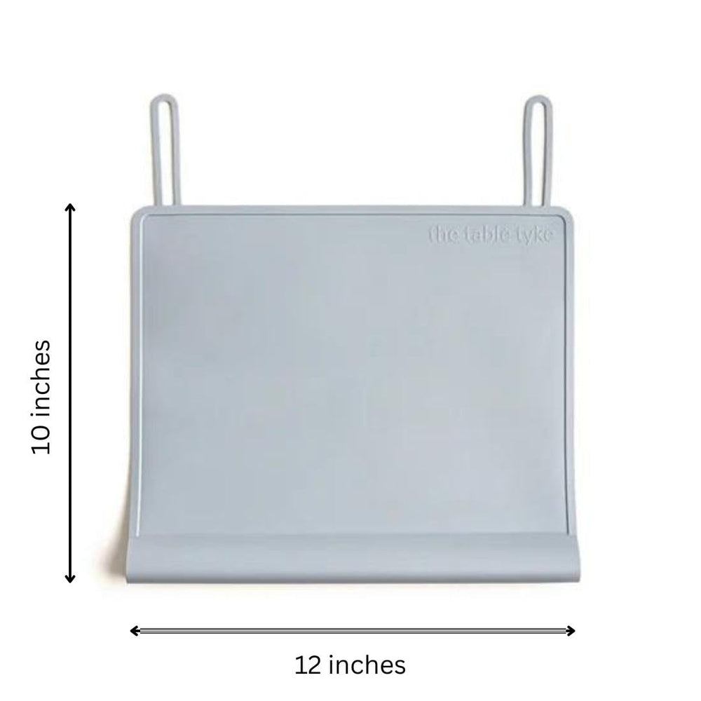 The Table Tyke restaurant-ready placemat protects surfaces during family dining outings.