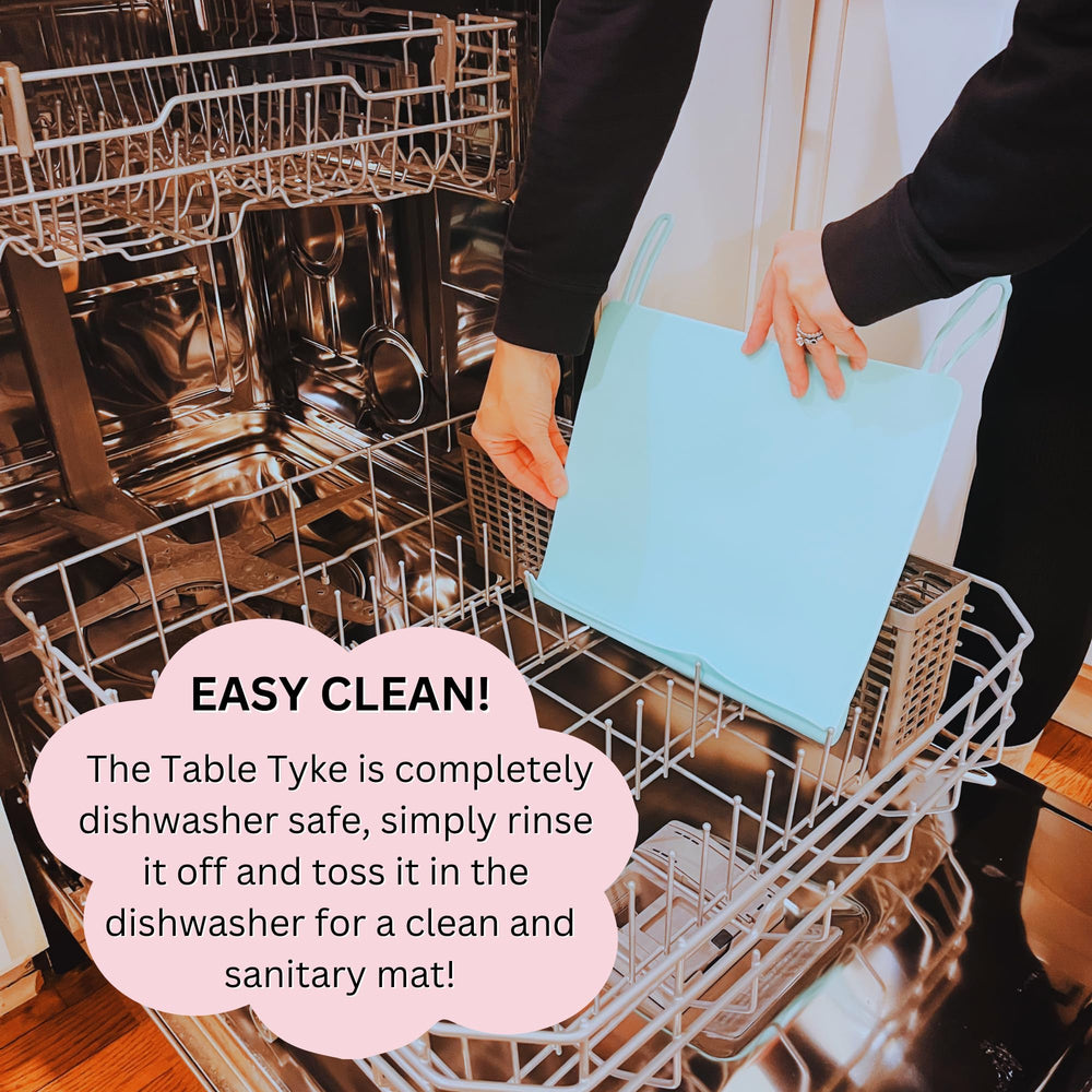 The Table Tyke raised edges contain spills during messy play sessions.