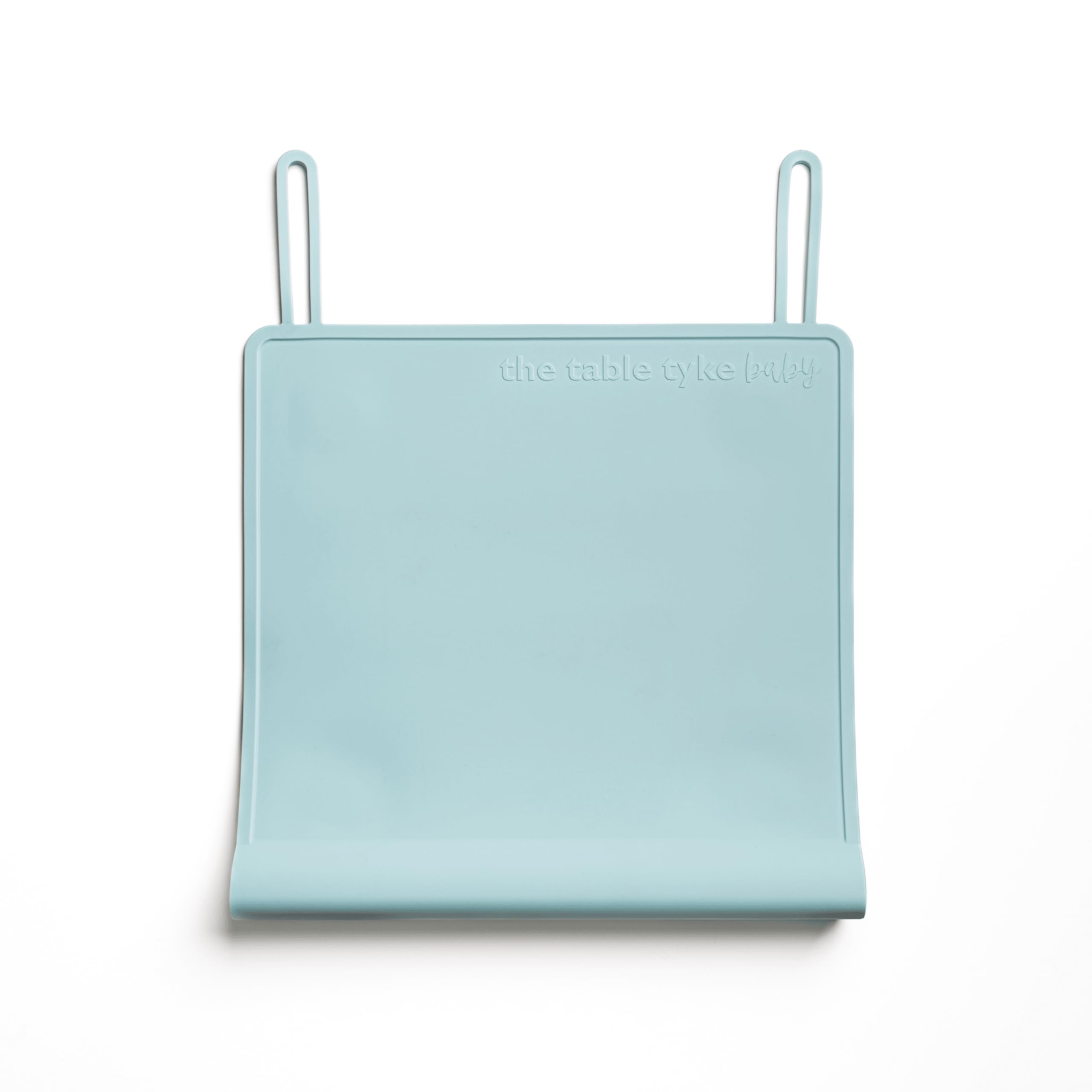 The Table Tyke placemat sky blue on table provides a safe, clean dining surface for kids.
