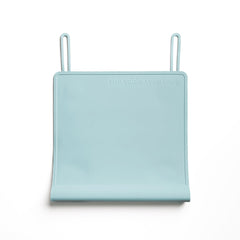 The Table Tyke placemat sky blue on table provides a safe, clean dining surface for kids.