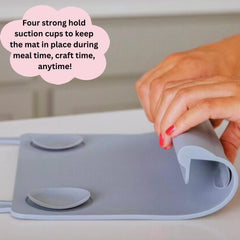 The Table Tyke placemat rolled for travel demonstrating compact portability
