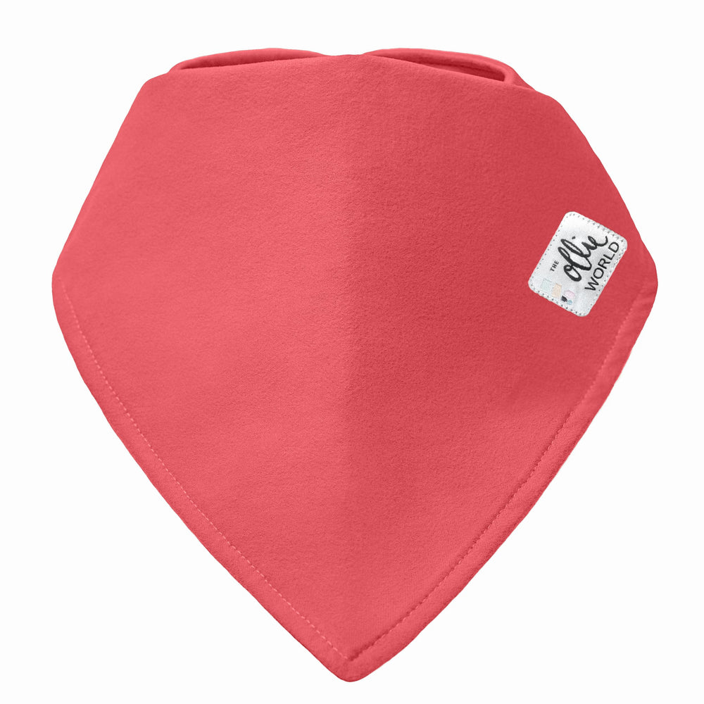 The Ollie bib adjustable snaps close-up highlights secure, customizable fit.