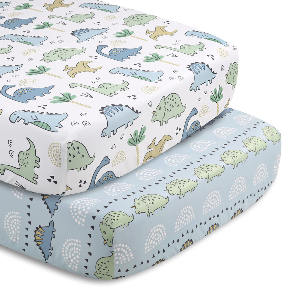 The Peanutshell blue dino second fitted sheet provides easy swaps for busy parents.
