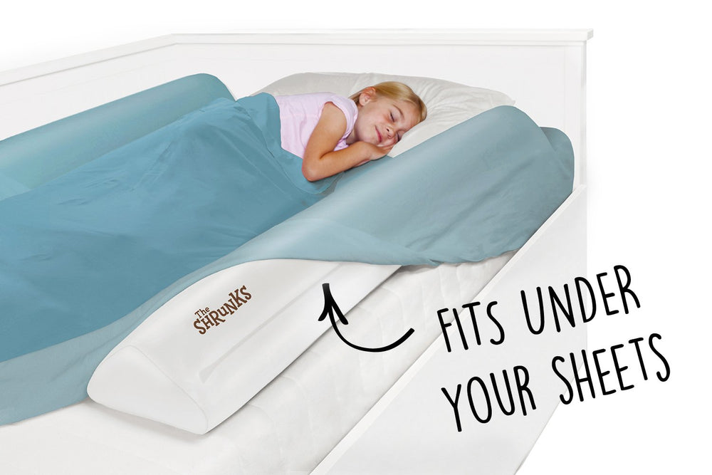 The Shrunks bed rail under sheets shows its low-profile big-kid design
