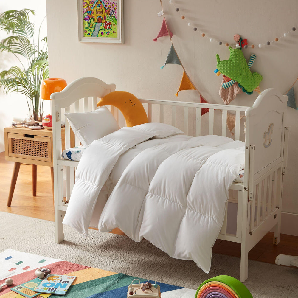Three Geese lightweight toddler comforter fabric closeup, ultra-soft and breathable for cozy nights.