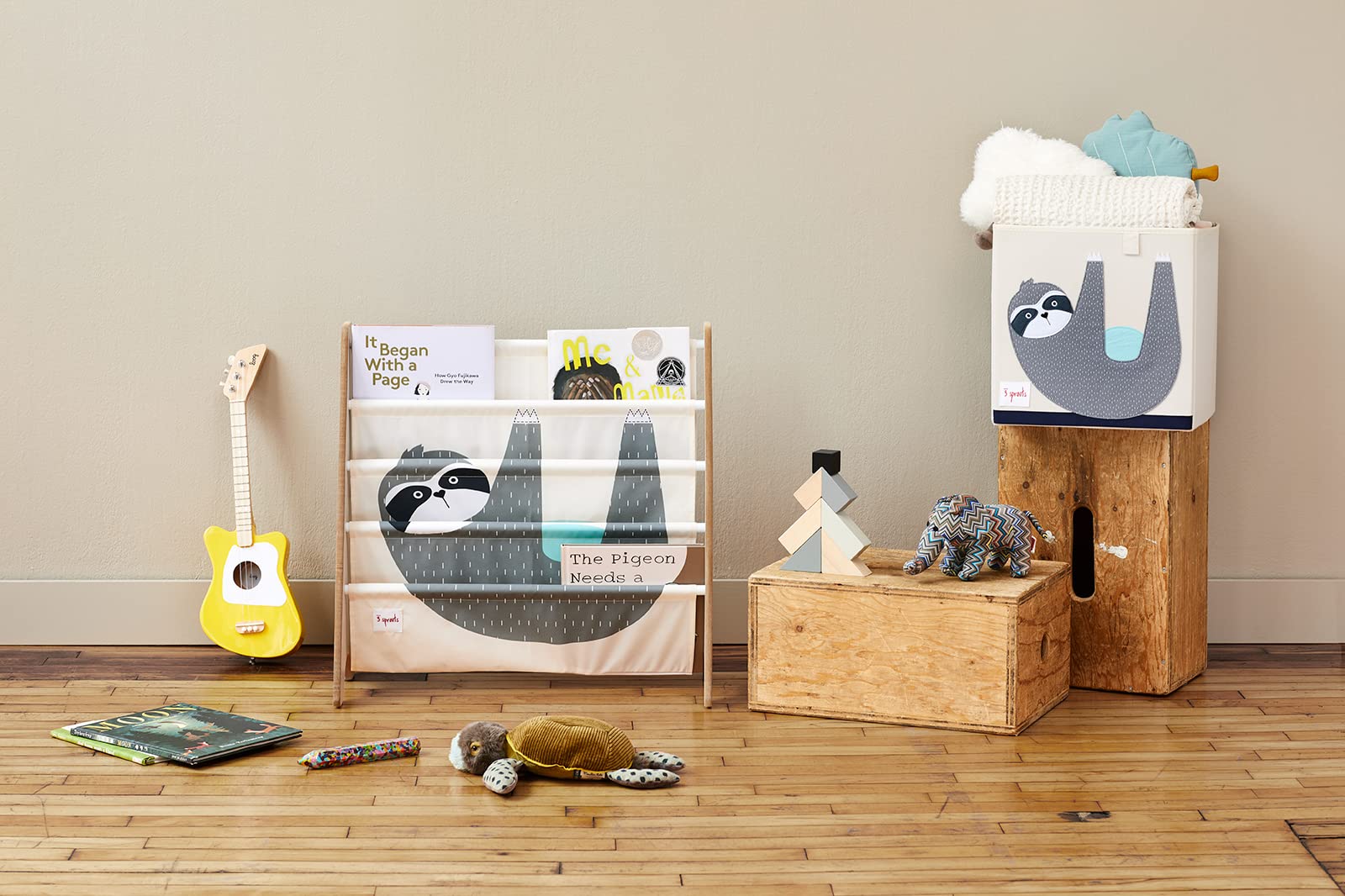 Three Sprouts toy storage cube collapsible design folds flat for space-saving storage.