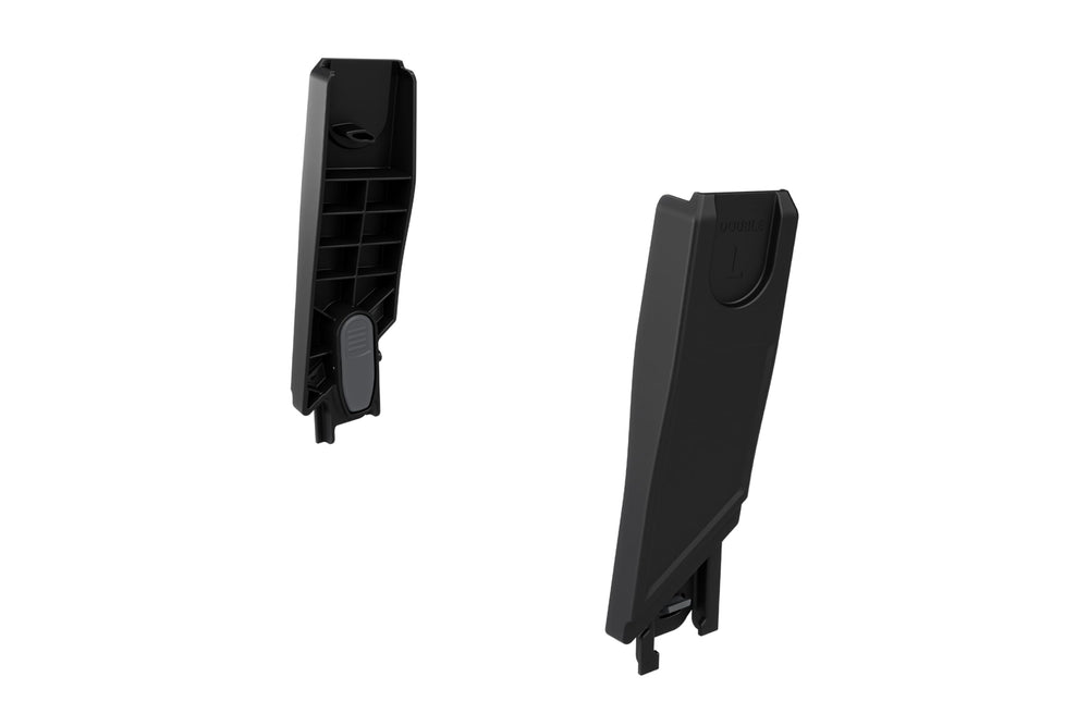 Thule Urban Glide 3 car seat adapter in use enabling secure, effortless transfers.