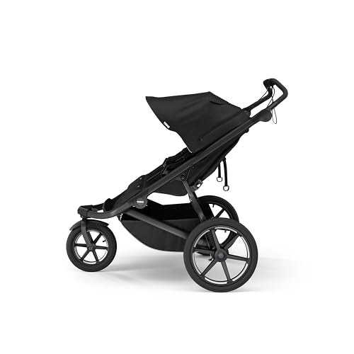 Thule Urban Glide 3 Double air-filled tires emphasize smooth rides on rough terrain.