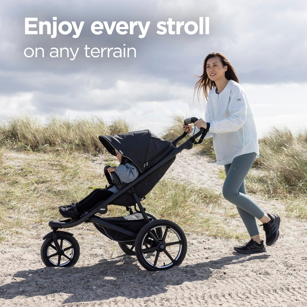 Thule Urban Glide 3 integrated hand brake emphasizes smooth speed control on varied terrain.