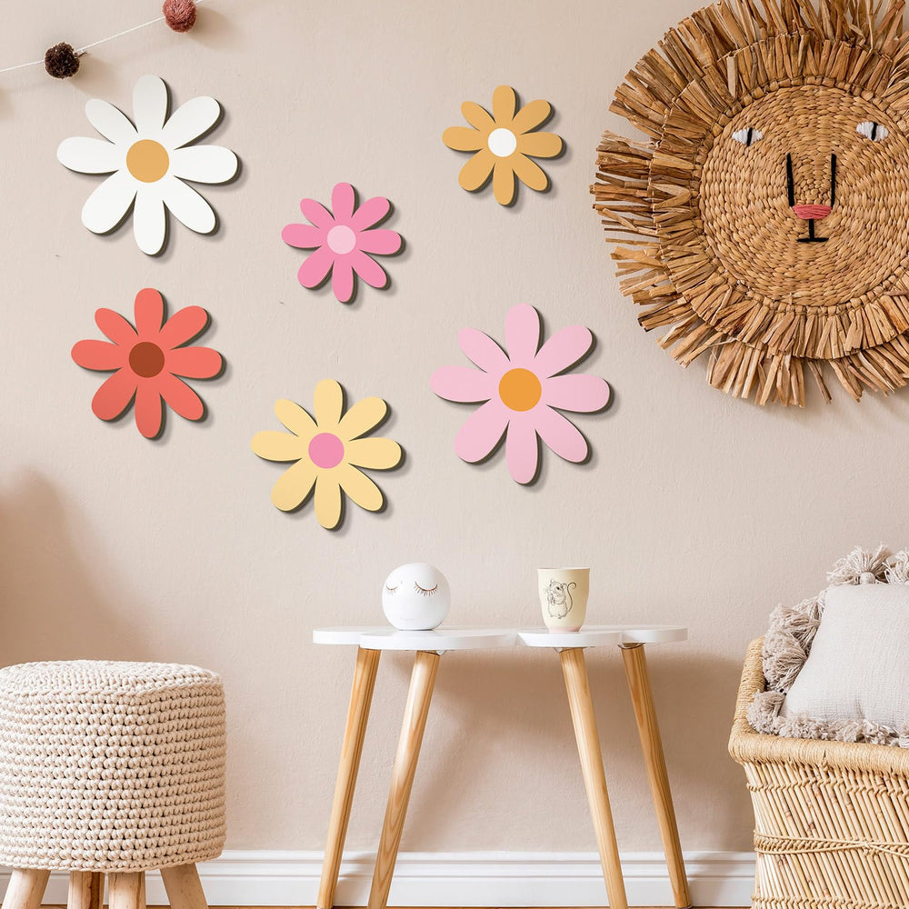 Thyle daisy wall decor closeup shows smooth wood and simple daisy design
