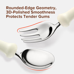 Thyseed utensils with curved handles aiding small hands during meals.